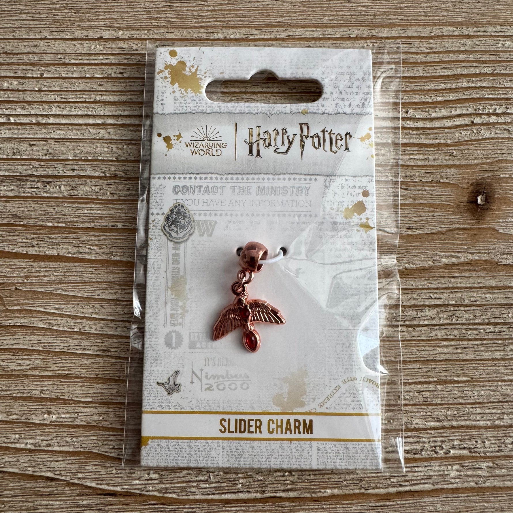 Phénix Doré Rose - Charm - Harry Potter Officiel Harry Potter